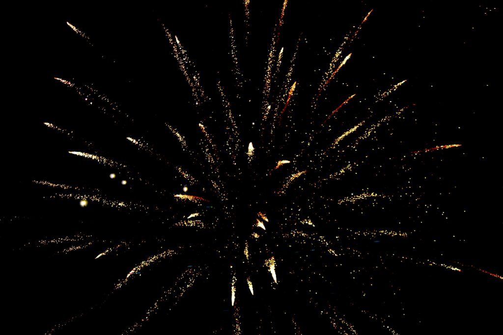 A stunning display of colorful fireworks illuminating the night sky.